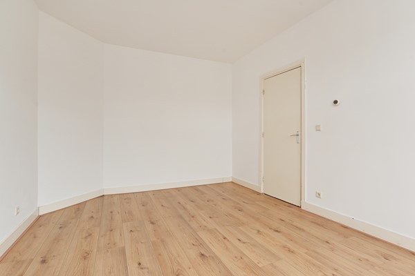 Medium property photo - Deimanstraat 309, 2522 BK Den Haag